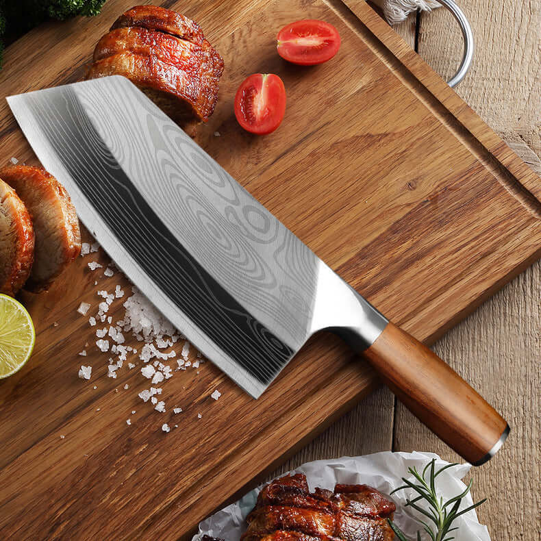 Stainless Steel Kitchen Knife resting on a wooden cutting board with fresh ingredients, showcasing its sharpness and craftsmanship.