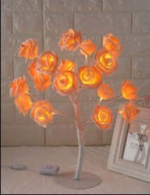 Rose Small Tree Lamp illuminating with warm light for elegant indoor decor, perfect for living rooms and bedrooms.