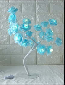 Rose Small Tree Lamp with glowing blue flowers, adding elegance and creativity to any indoor space.