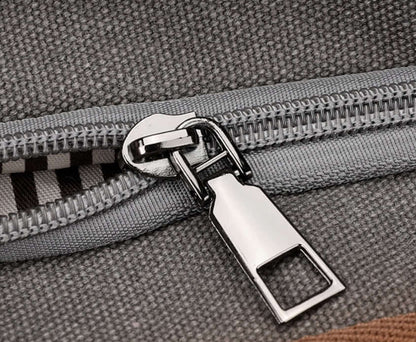 Close-up of zipper detail on gray canvas Simple Tote Bag showcasing high-quality craftsmanship.