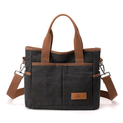 Simple Tote Bag in black canvas with brown handles, versatile for daily use, showcasing durable and lightweight design.
