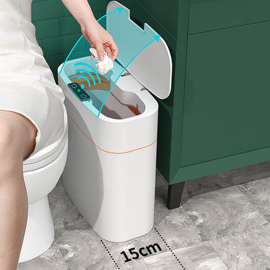 A person using a Smart Trash Can with self-opening lid, showcasing its modern design and functionality.
