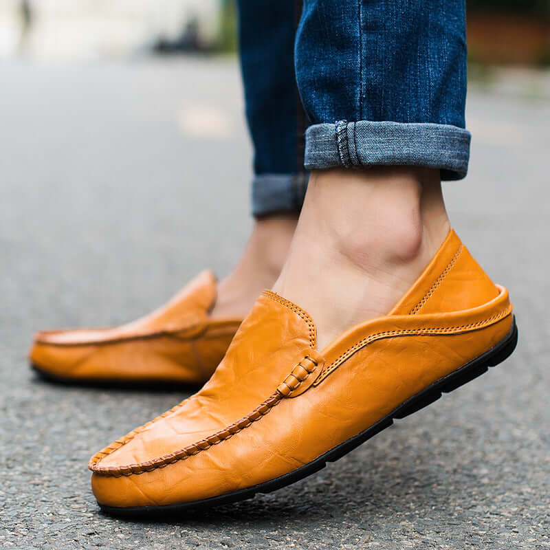 Soft Bottom Leather Loafers in yellow brown with casual design, worn with jeans, showcasing premium craftsmanship and comfort.