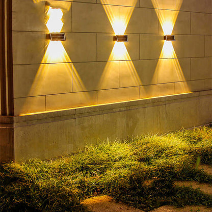 Solar Exterior Wall Light illuminating a wall, highlighting energy-efficient outdoor ambiance with stylish design.
