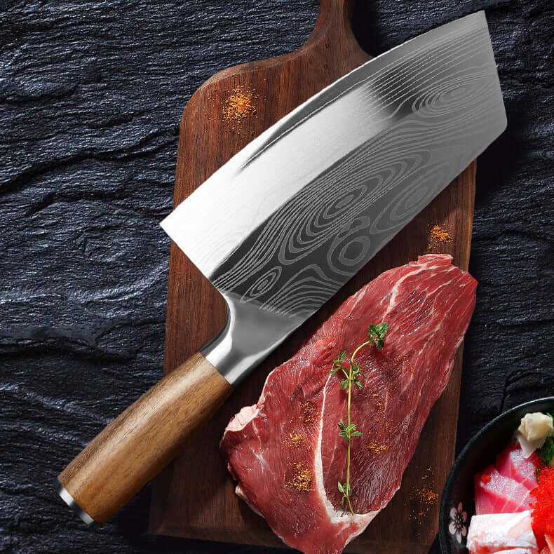 Stainless Steel Kitchen Knife on a wooden cutting board with raw meat, showcasing its sharpness and craftsmanship.