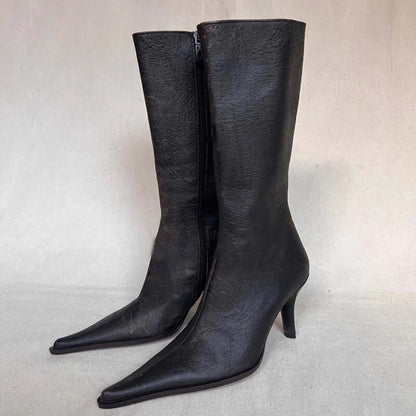 Elegant black stiletto heel cowgirl boots with durable artificial PU and high heel design, perfect for versatile styling.
