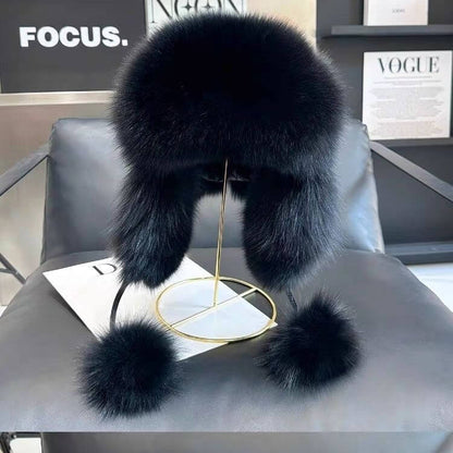 Stylish black Ushanka fur hat displayed on a stand, showcasing winter fashion and warmth.