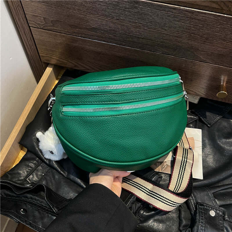 Green Ladies Chest Bag with zipper detail, made from high-quality PU material. Stylish urban design with soft cotton lining.