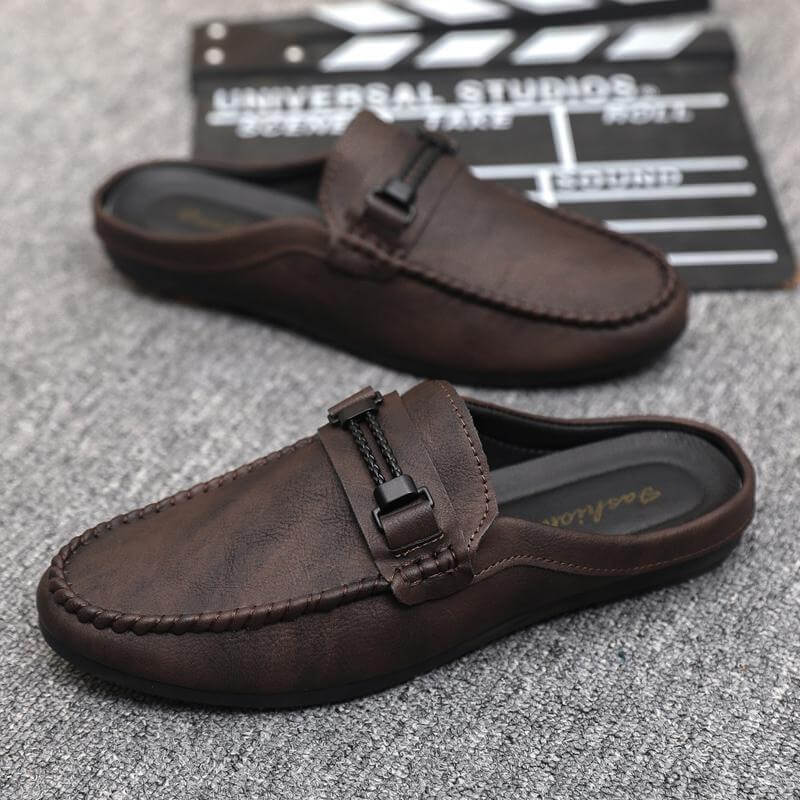 Brown open heel loafers with a rubber sole, showcasing stylish design and flexibility, perfect for any casual outfit.