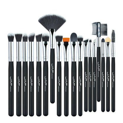 Complete kit of makeup brushes with black handles, featuring synthetic fibers for various applications. Cruelty-free and hypoallergenic.