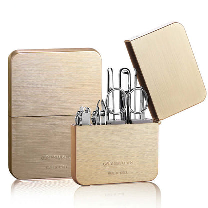 Gold Finger Nail Clippers Set with precision clippers and dead skin shovel in a compact case.