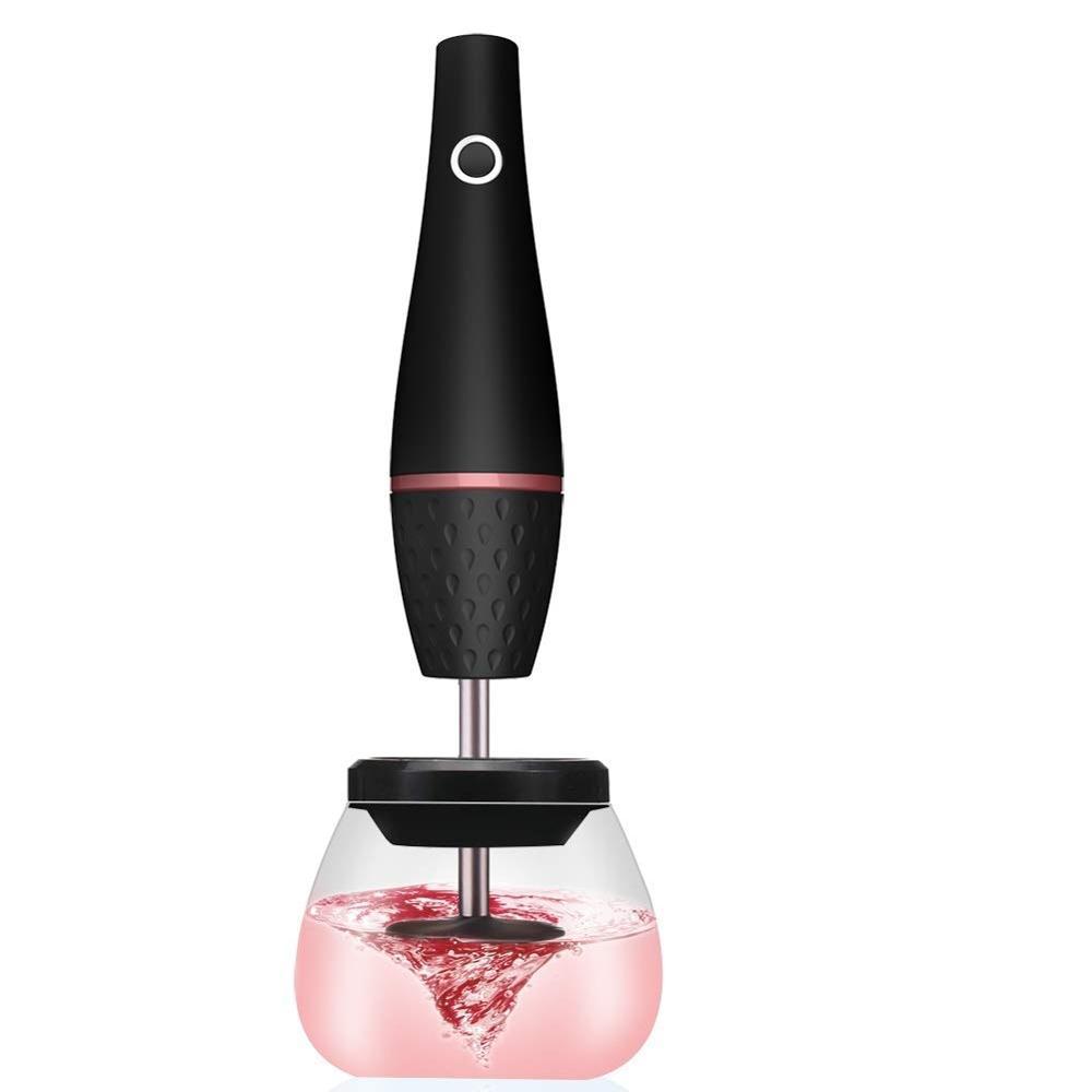 Black Makeup Brush Cleaning Machine with pink soap in a clear bowl, showing automatic cleaning process. Rechargeable and compact design.