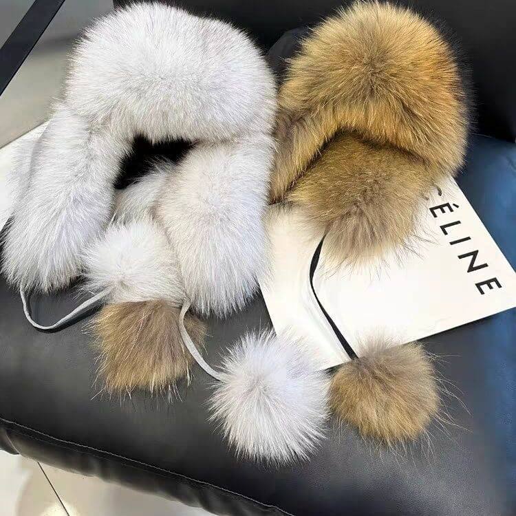 Stylish Ushanka Fur Hats in gray and tan colors, showcasing luxury winter fashion and warmth.