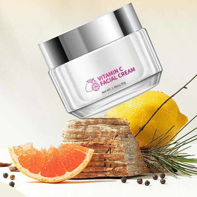 Nourishment Cream in 30g container with vitamin C, ideal for all skin types, with citrus and natural elements in background.