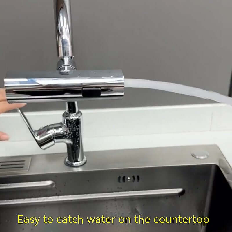 Waterfall Kitchen Faucet delivering a stream of water into the sink, showcasing ease of use and modern design.