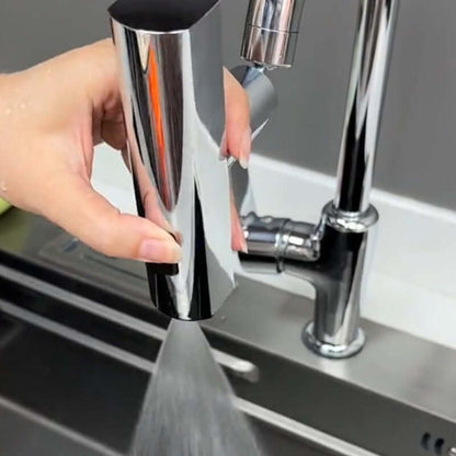 User operating a sleek Waterfall Kitchen Faucet, showcasing its modern design and efficient water flow.